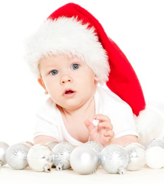 Kırmızı şapkalı Noel çocuğu.
