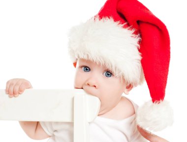 Kırmızı şapkalı Noel çocuğu.