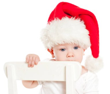 Kırmızı şapkalı Noel çocuğu.