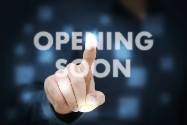 Businessman touching OPENING SOON