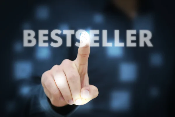 Zakenman hand aanraken van bestseller — Stockfoto