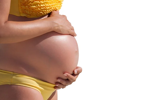 Wanita hamil dengan tangan di atas perut — Stok Foto
