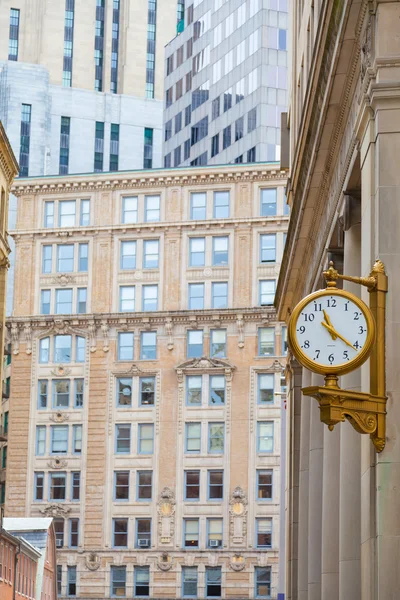 A old fashion clock in Boston downtown in summer time