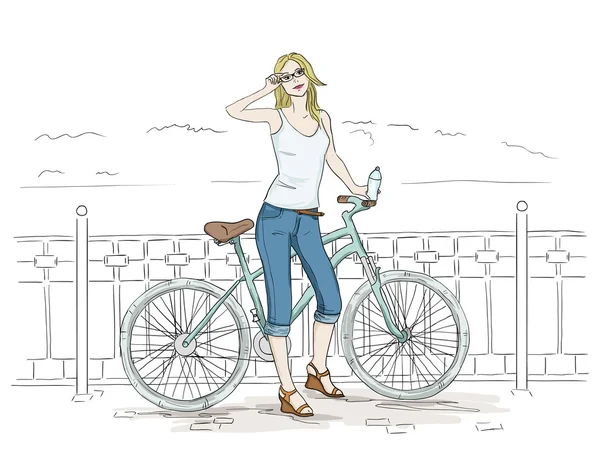 Mujer joven con dibujo en bicicleta. Chica bonita en vaqueros azules — Archivo Imágenes Vectoriales