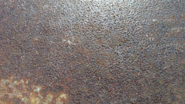 Paslanmış ve koyu metal, paslı doku arka planı. Gerçekçi russet örneği, şablon fon. Desenli illüstrasyon pankartı.