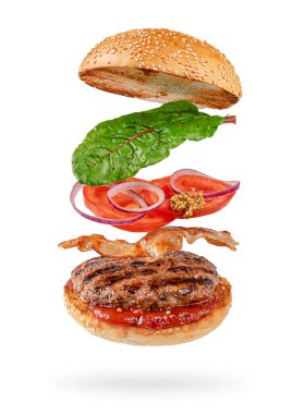 Beyaz arkaplanda izole edilmiş kırpma yolu olan uçan hamburger.