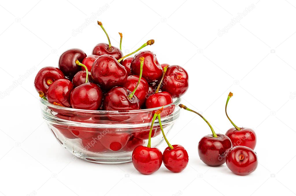 Sweet cherry transparent bowl on white background.