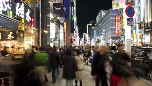 Tiendas iluminadas por la noche, Tokio — Vídeo de stock