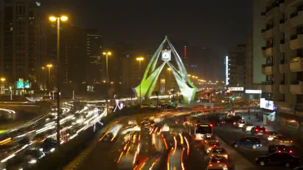 Klokkentoren rotonde 's nachts, Dubai — Stockvideo