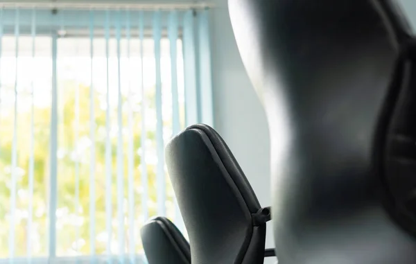 Office workplace chair with window nature view in the evening, relax comfortable business workspace