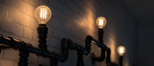 Light bulbs on Long Metal Pipe, Light Energy Industry Line, Vintage Design Decoration
