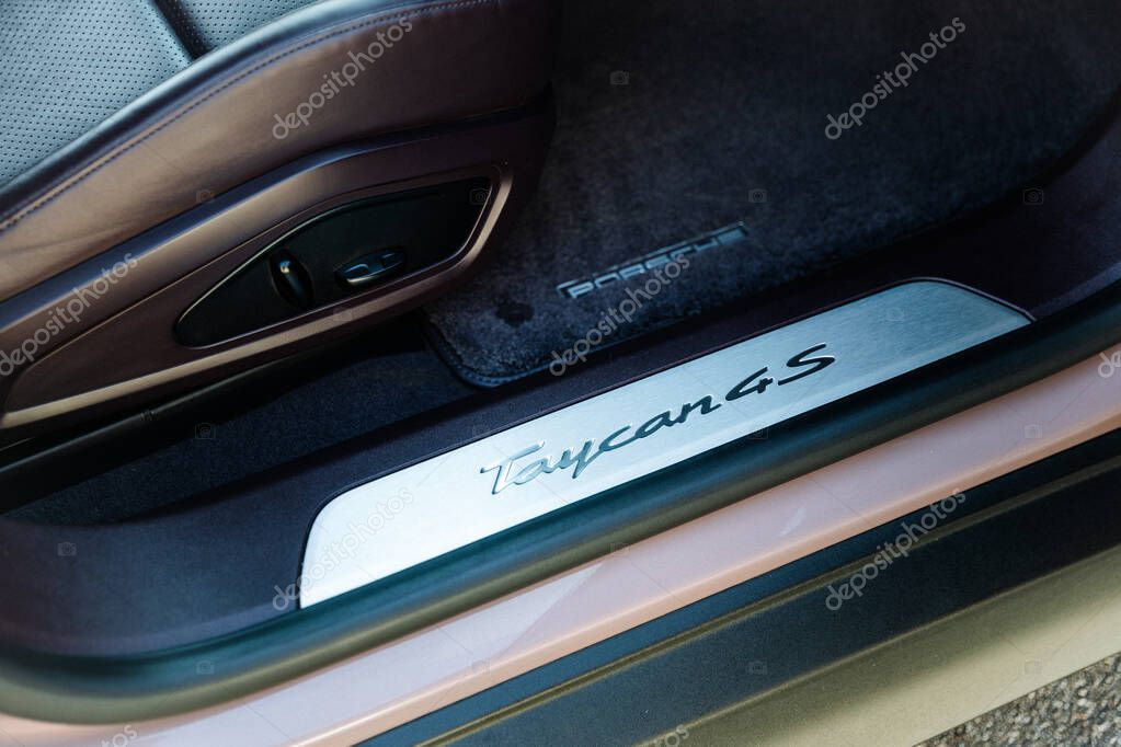 Vinnitsya, Ukraine - 15 of July 2025: Taycan 4S door sill plate close up interior detail. High quality photo