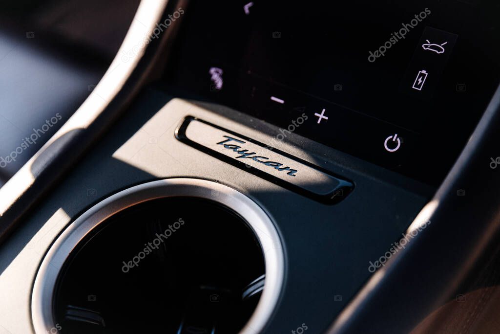 Vinnitsya, Ukraine - 15 of July 2025: Close up of Porsche Taycan console and charging controls. High quality photo