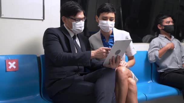 Businessman Using Smart Tablet Meeting Woman Face Mask Metro Train — Stock Video