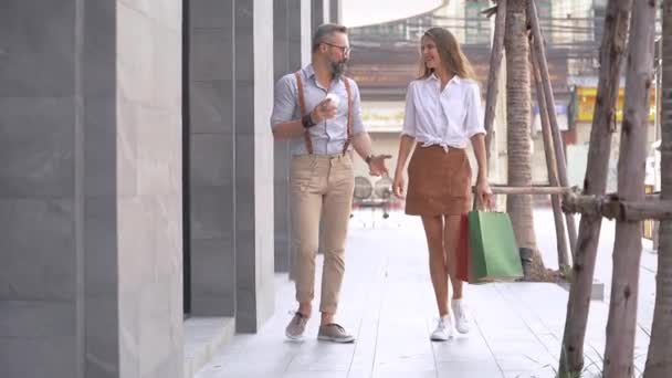 Senior Man Woman Holding Shopping Bag Walking Outdoor Pedestrian Walkway — Stock Video