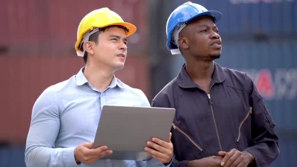 Businessmen Holding Laptop Talking Factory Worker Engineer Container Shipping Area — Stockvideo