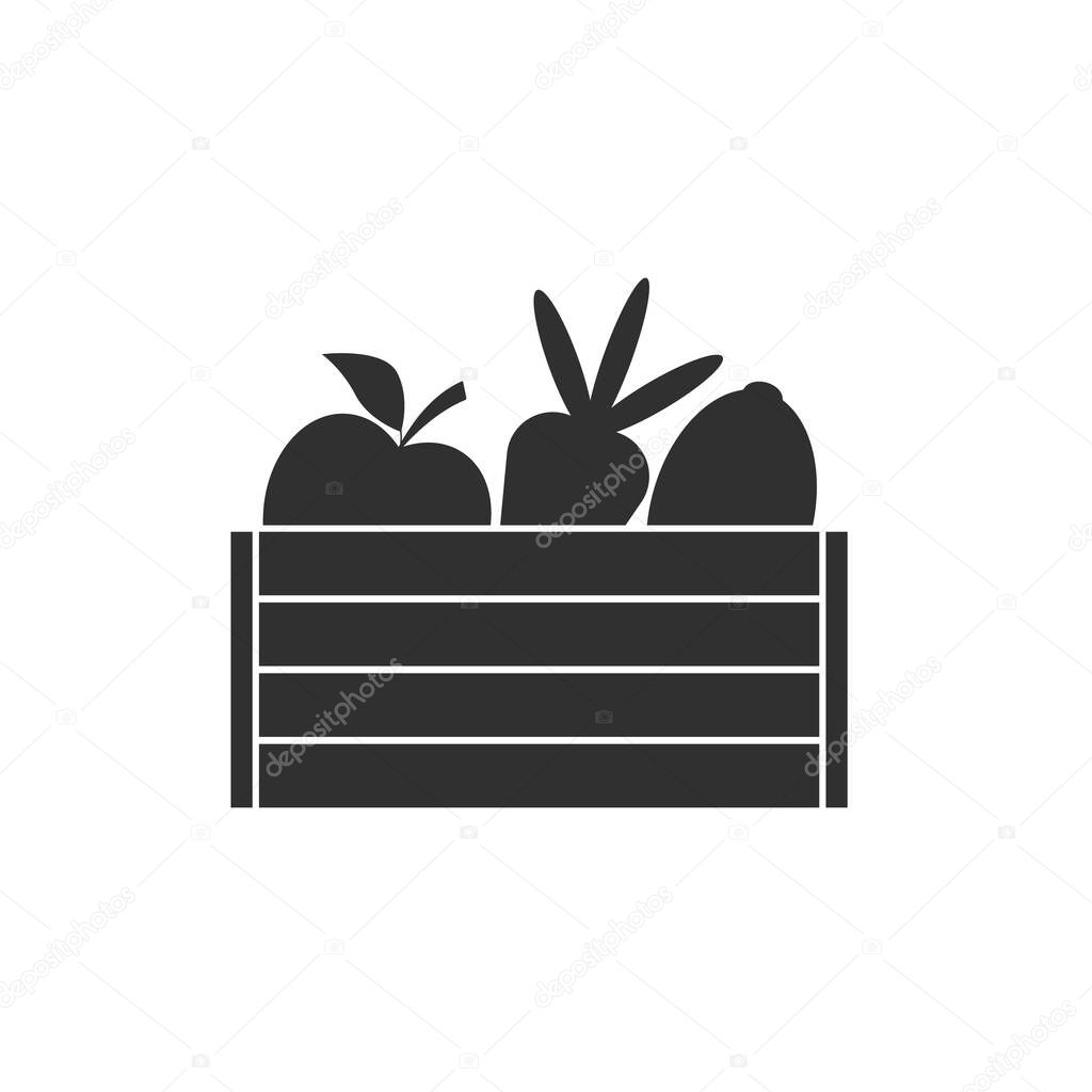 Silhouettes ripe fruits and vegetables in a wooden crate. Harvest icon. Apple, carrot and lemon in a wooden box. Black and white vector. Isolated illustration on white blank background.