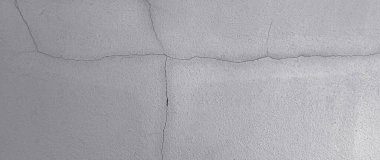 Çatlak duvar dokusu bina sütunları arka planda kırık deprem etkisi, çimento hasarı şekilli grunge yüzey soyutlaması. Değil ai