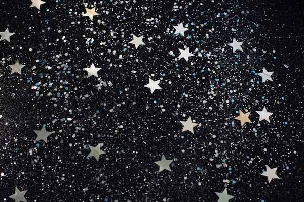 Estrellas de plata sobre fondo negro. Superposición perfecta de estrellas. — Foto de Stock