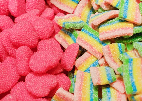 Surtido de muchos coloridos y sabrosos caramelos de goma. fondo dulces. —  Fotos de Stock