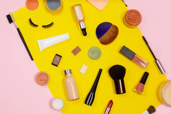 Set of decorative cosmetics on color background.