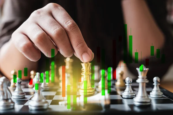 Business playing chess with virtual strategy financial.