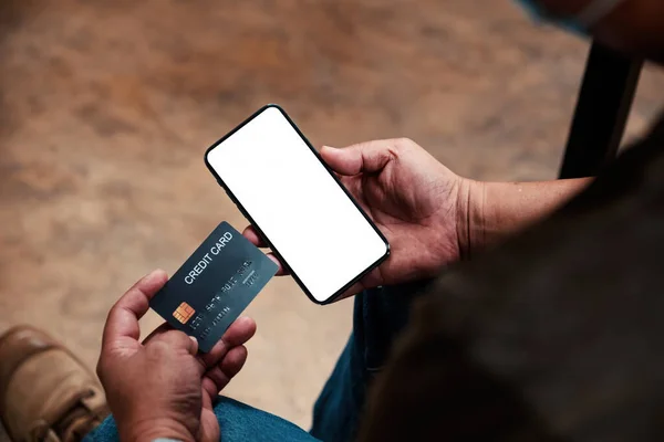 Hands holding smartphone blank screen and credit card. — Stock Photo, Image