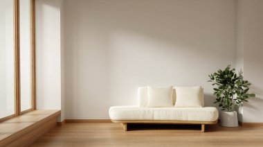 İç tasarımda zarafet ve sükuneti ön plana çıkaran, beyaz bir kanepesi ve yeşili olan modern bir minimalist oturma odası..