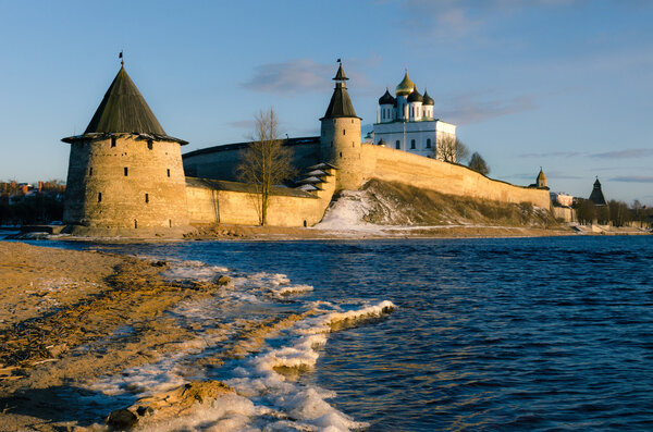 Ancient fortress on the river bank. Russia. Pskov Kremlin. Pskov day time.