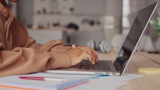 Woman working on computer using touchpad typing corporate message communicating — Stock Video