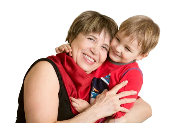 Encantador niño con su abuela tener momentos divertidos y felices juntos en casa — Foto de Stock