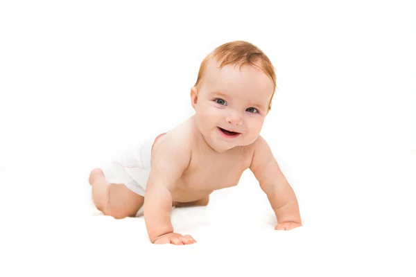 Мила маленька смішна повзаюча дитина ізольована на білому — стокове фото