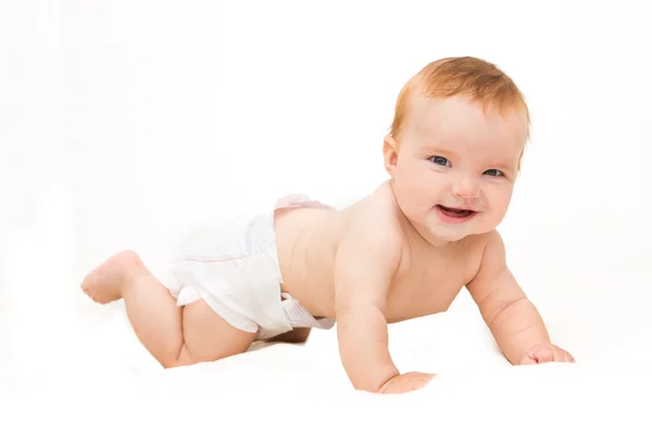 Lindo poco riendo arrastrando bebé aislado en blanco —  Fotos de Stock