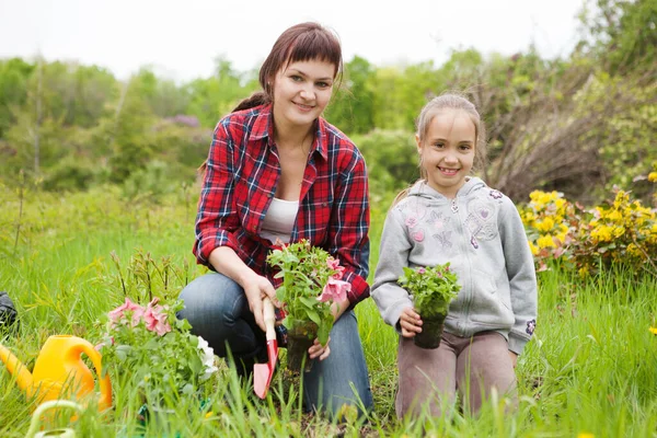 Young Woman Little Girl Planting Flowers Together Garden Girl Helping — Stock Photo, Image