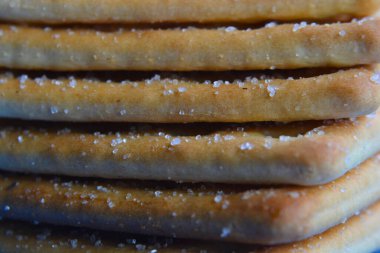 a stack of cookies with a white plate