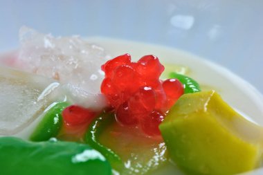 thai dessert, sweet jelly with milk, sugar and sugar topping,