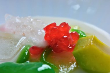 thai dessert with coconut jelly and coconut milk.