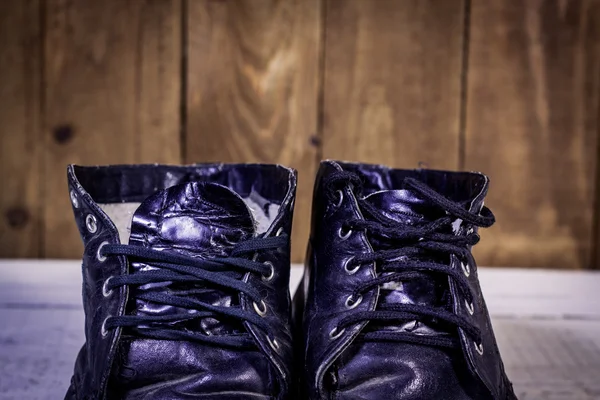 Close-up van bicture van zwarte laarzen — Stockfoto