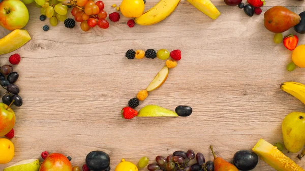 Fruits made letter Z. The letters are made up of fruits. Alphabet on a table.