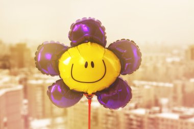 Air balloon with smiley face clipart