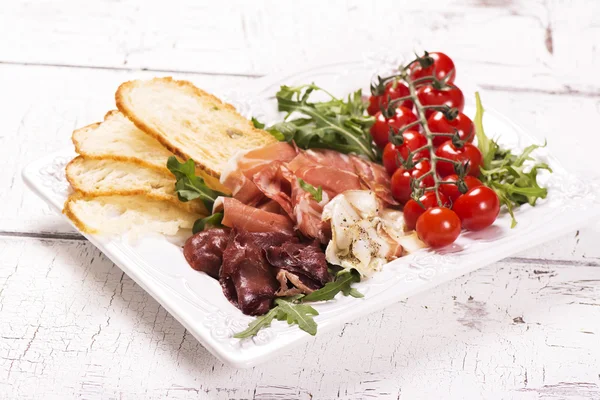 Assortment of traditional italian appetizers — Stock Photo, Image