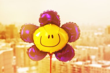 Air balloon with smiley face clipart