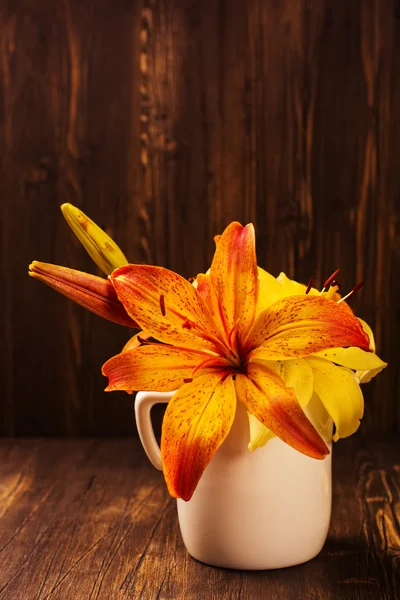 Bunch of orange and yellow lilly flowers — Stock Photo, Image