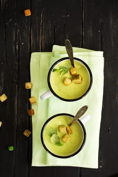 Green gazpacho soup in enamel mugs — Stock Image Green gazpacho soup in enamel mugs Royalty Free Stock Images