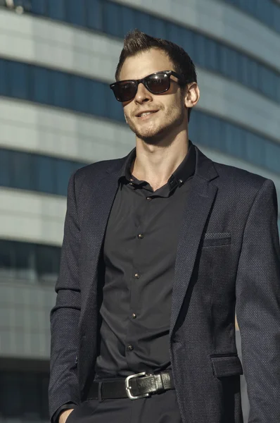 Smiling businessman in a suit — Stock Photo, Image