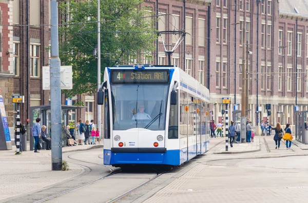 stock image Tram in Leaving the Stop near the Central Train Station in Amsterdam