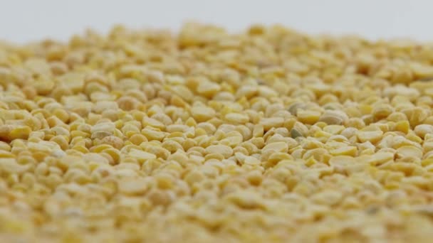 黄色のエンドウ豆の杭回転 — ストック動画
