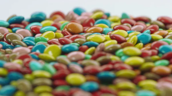 Farverig belagt chokolade slik roterende Stock-billede