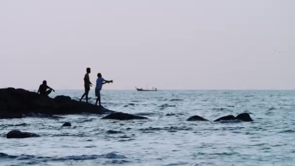 Fisherman at red sunset — Stock Video