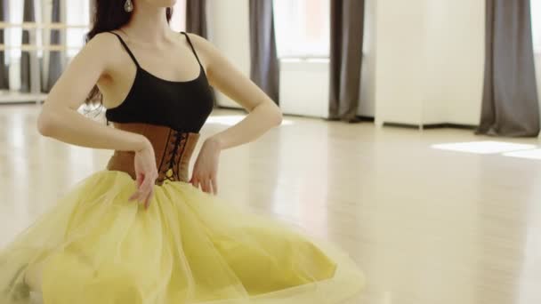 Beautiful girl wearing  dancing costume with corset — Stock Video